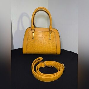 Mustard handbag with an attachable long strap so you can use as crossbody 11x4x8